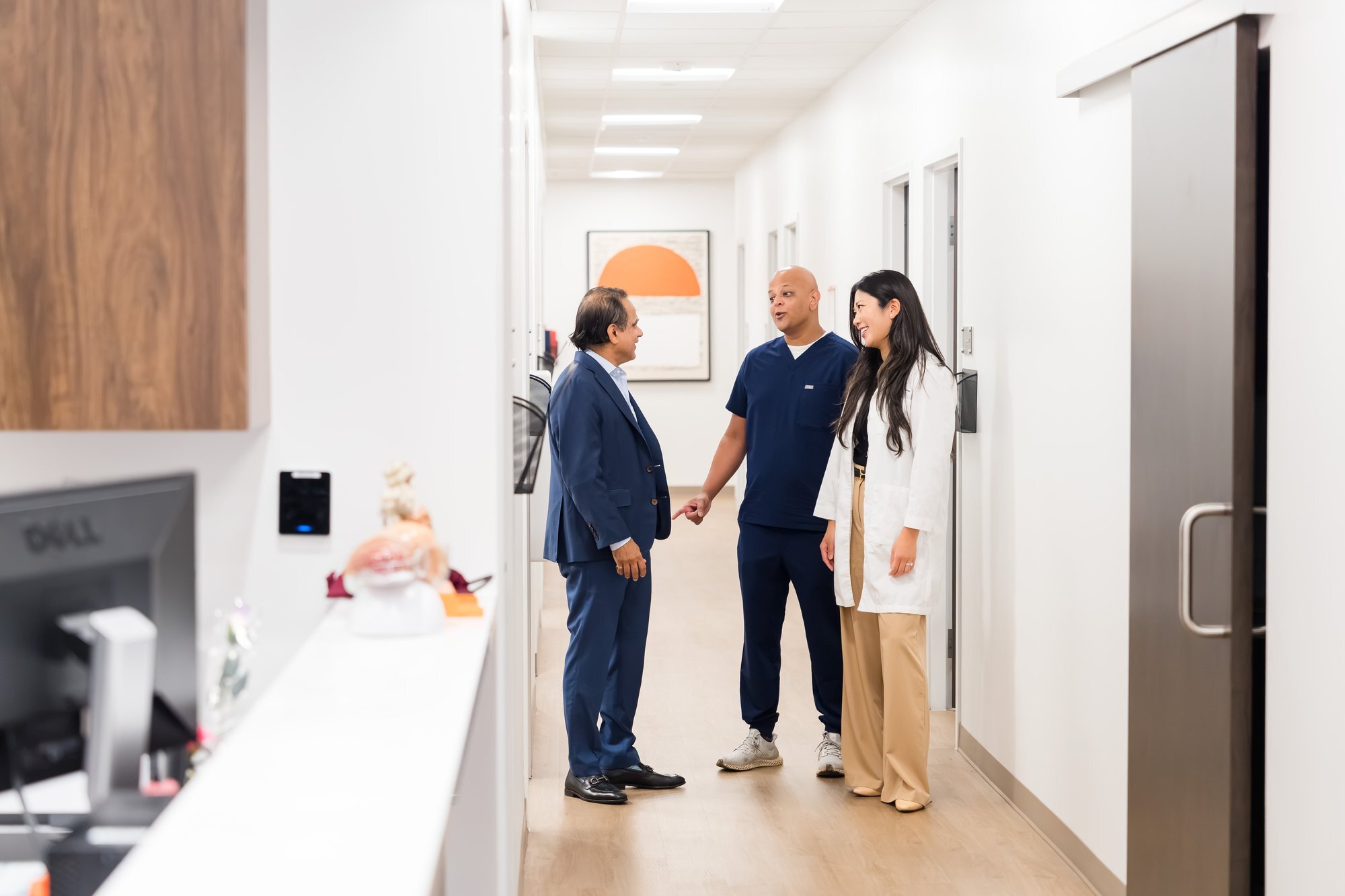 Austin Gastroenterology staff consultation in hallway