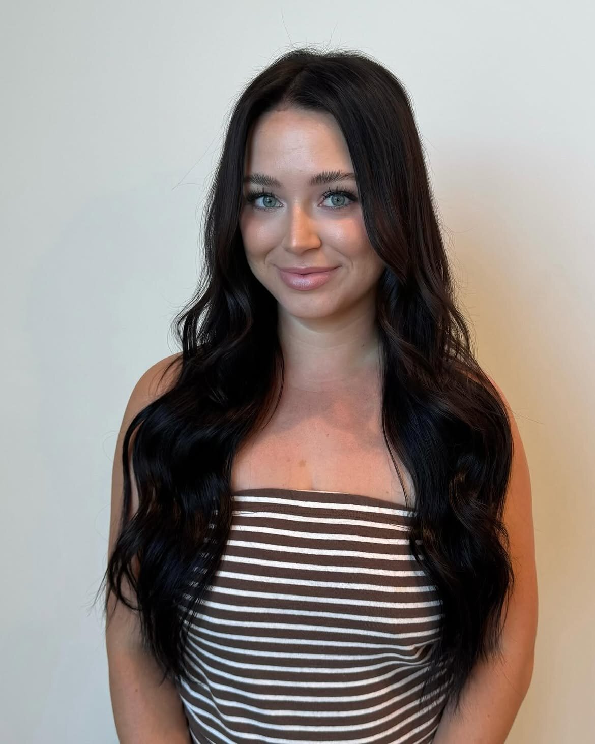 Brunette hair color and hand-tied extensions by Echelon Salon in Eagle, Idaho