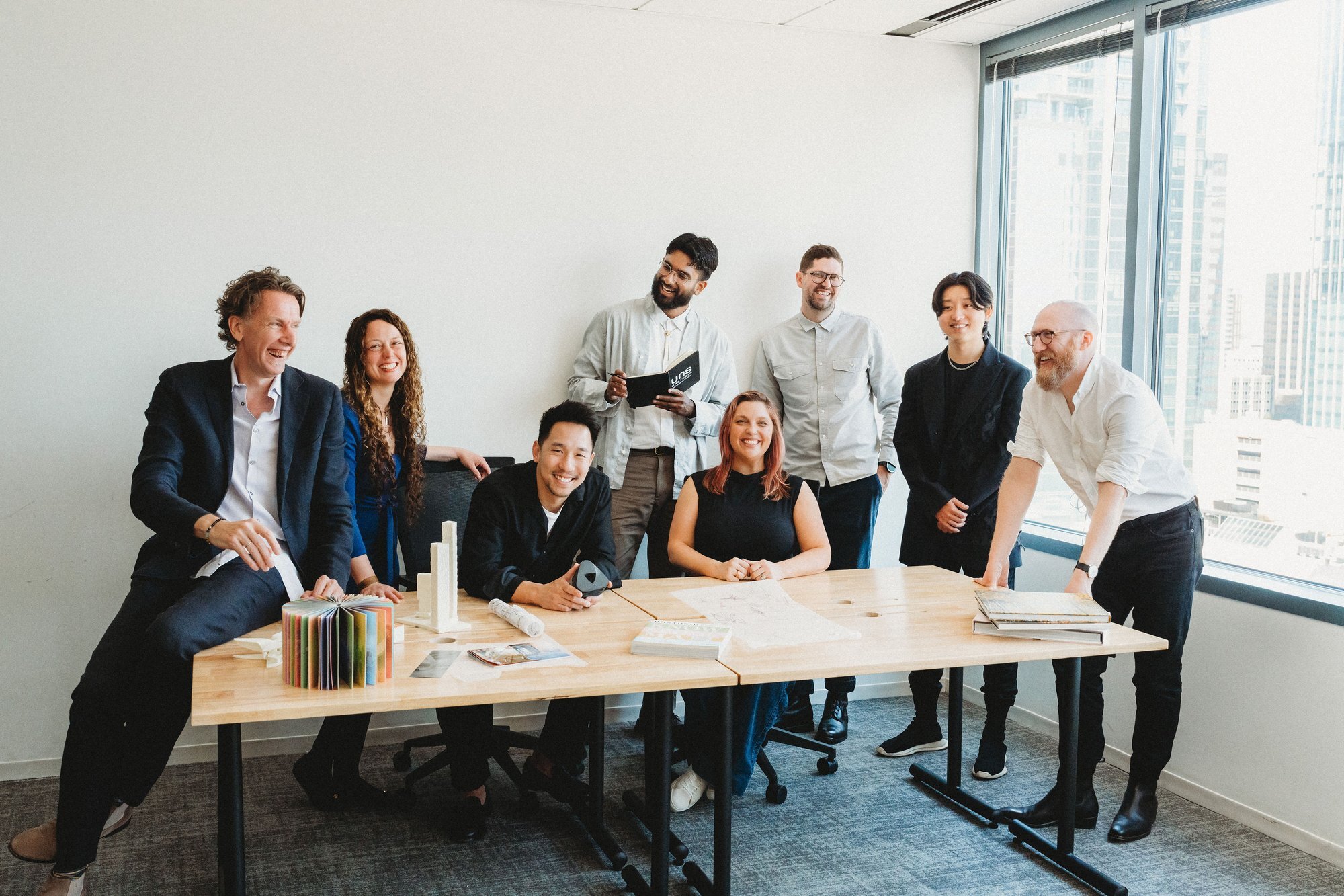 UNS team culture photography, candid and laughing in Austin