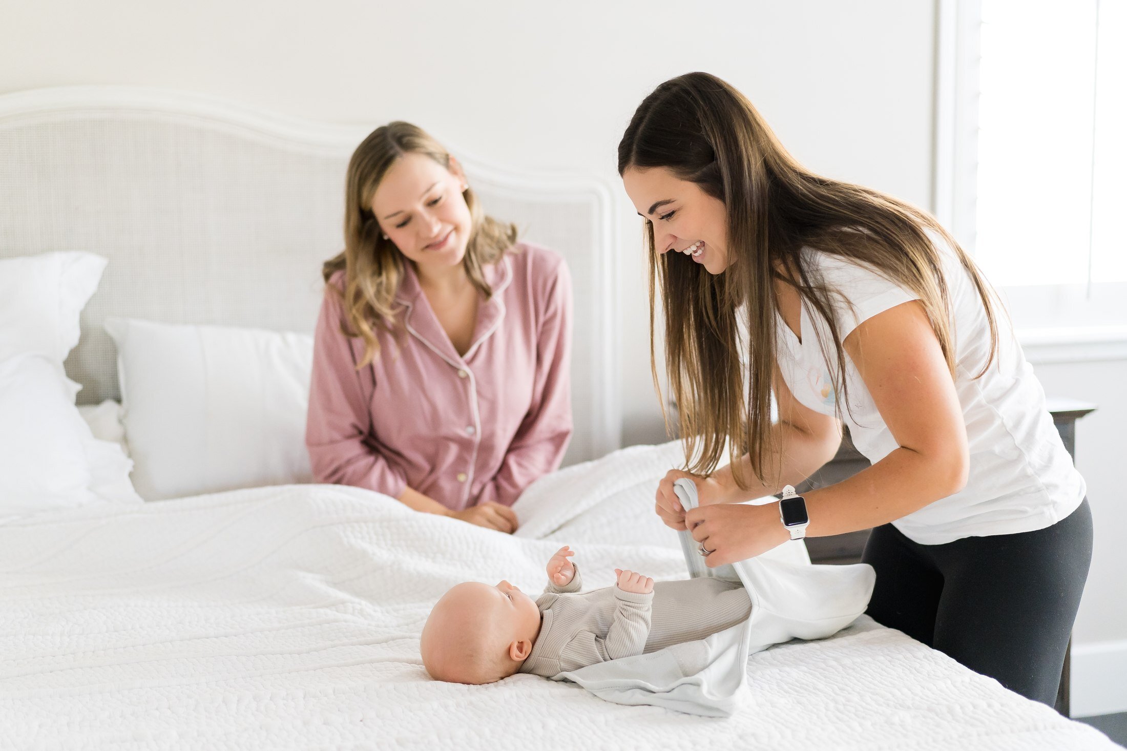 Newborn care class swaddle demonstration for Stork Maternity Consulting