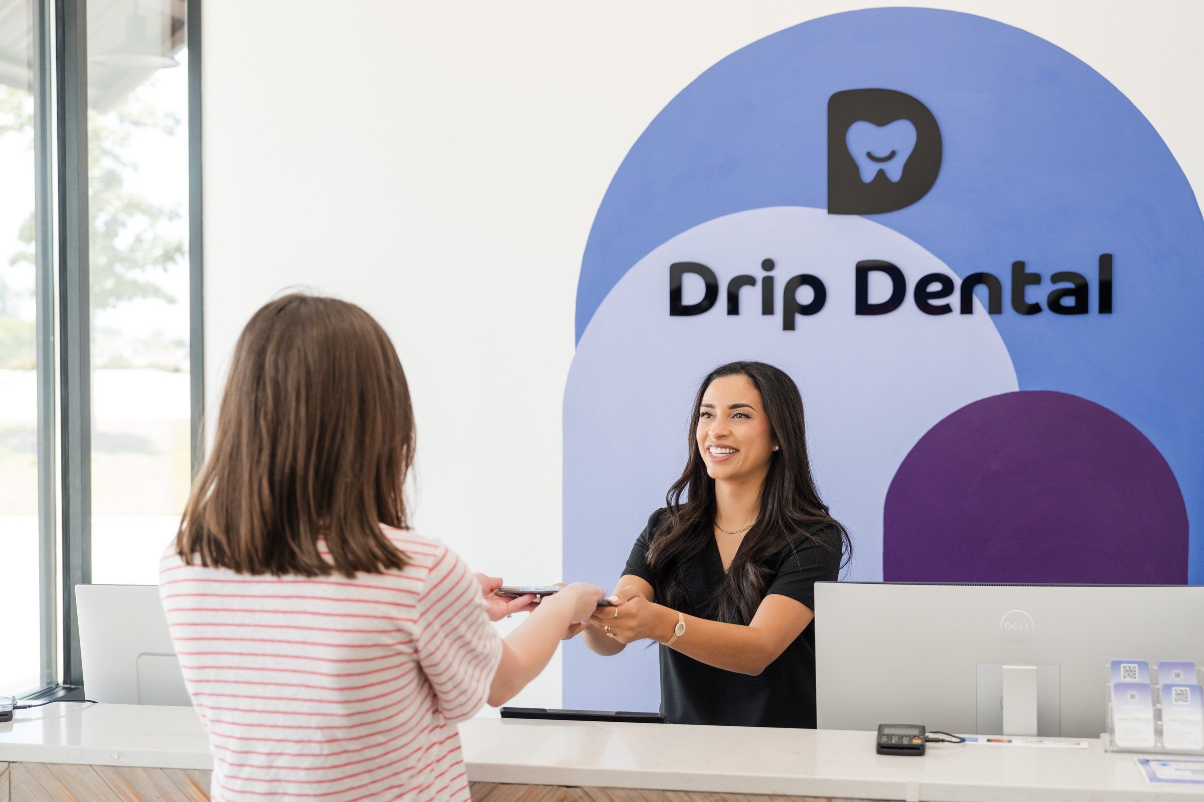 Drip Dental front desk check-in, dental office photography in Dripping Springs, TX