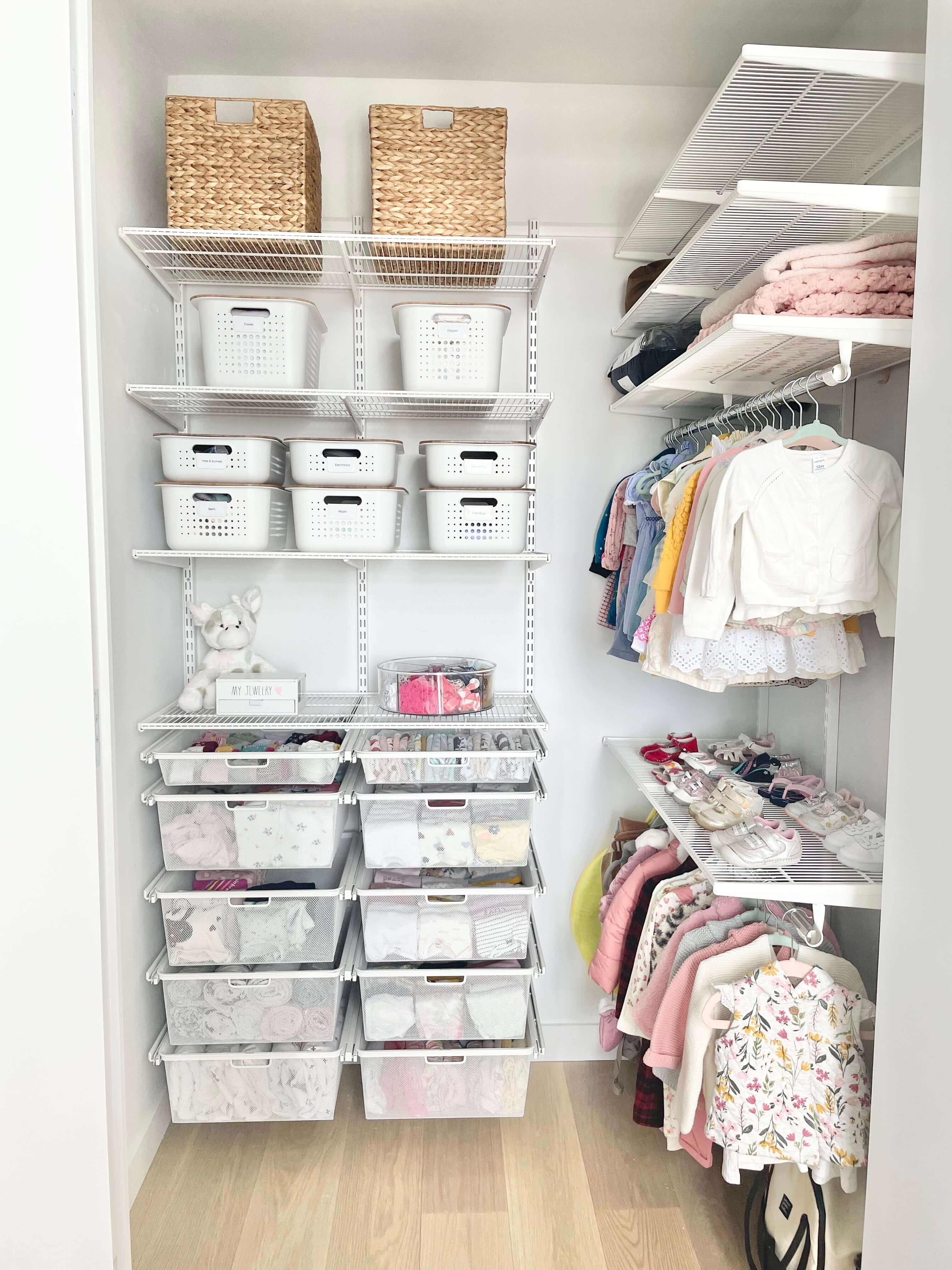 Organized kids' closet with hanging clothes, shoe shelves, storage baskets, and pull-out drawers.