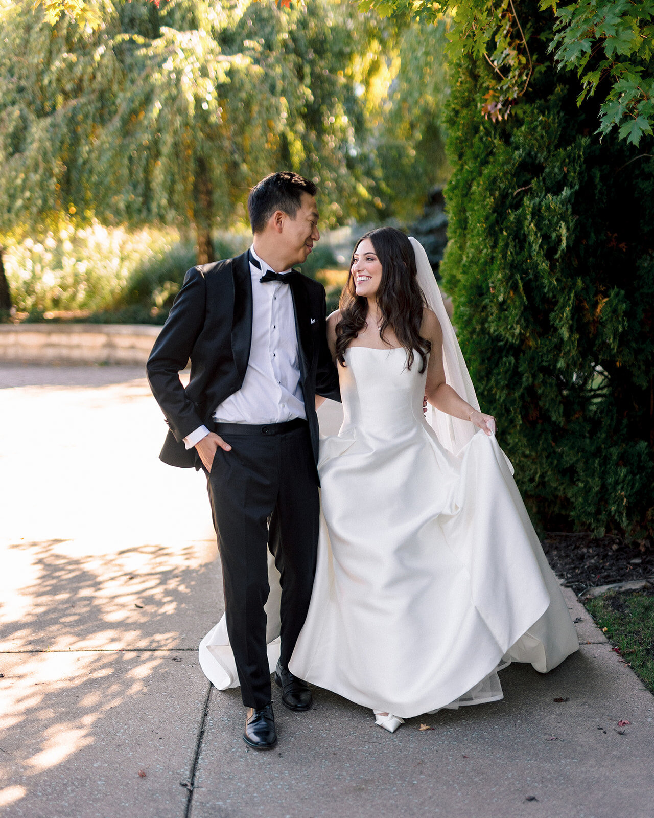 Emily and JoonYong walking together at New Vintage Place in Grand Rapids