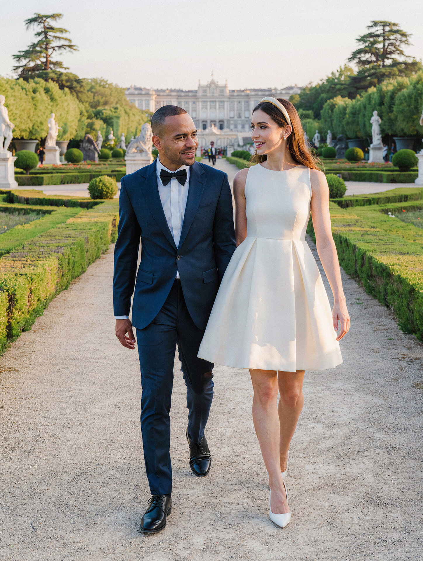 Bride and groom portrait in the Royal Palace gardens in Madrid, Spain