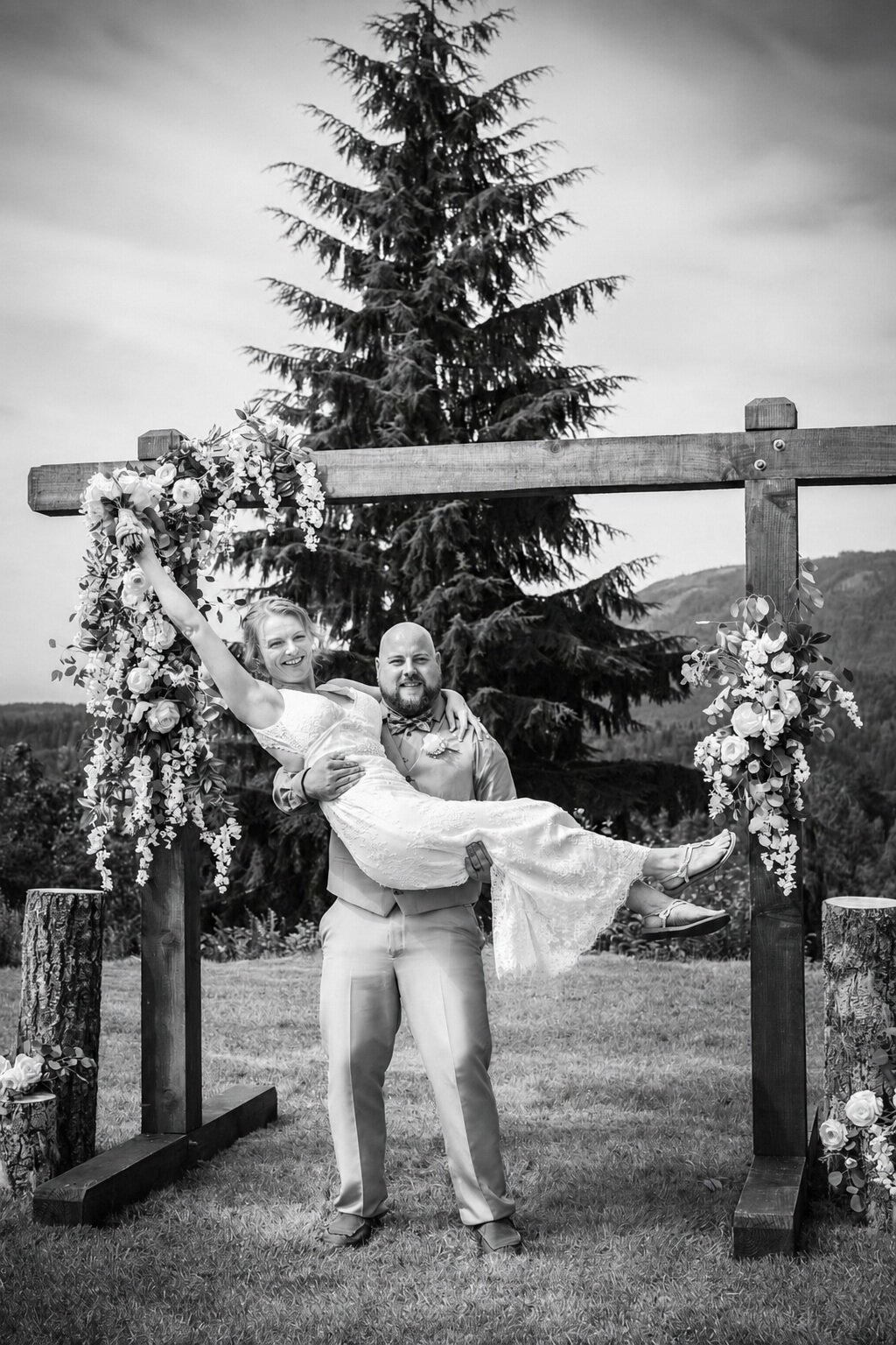 Black and white newlyweds celebrating after their ceremony