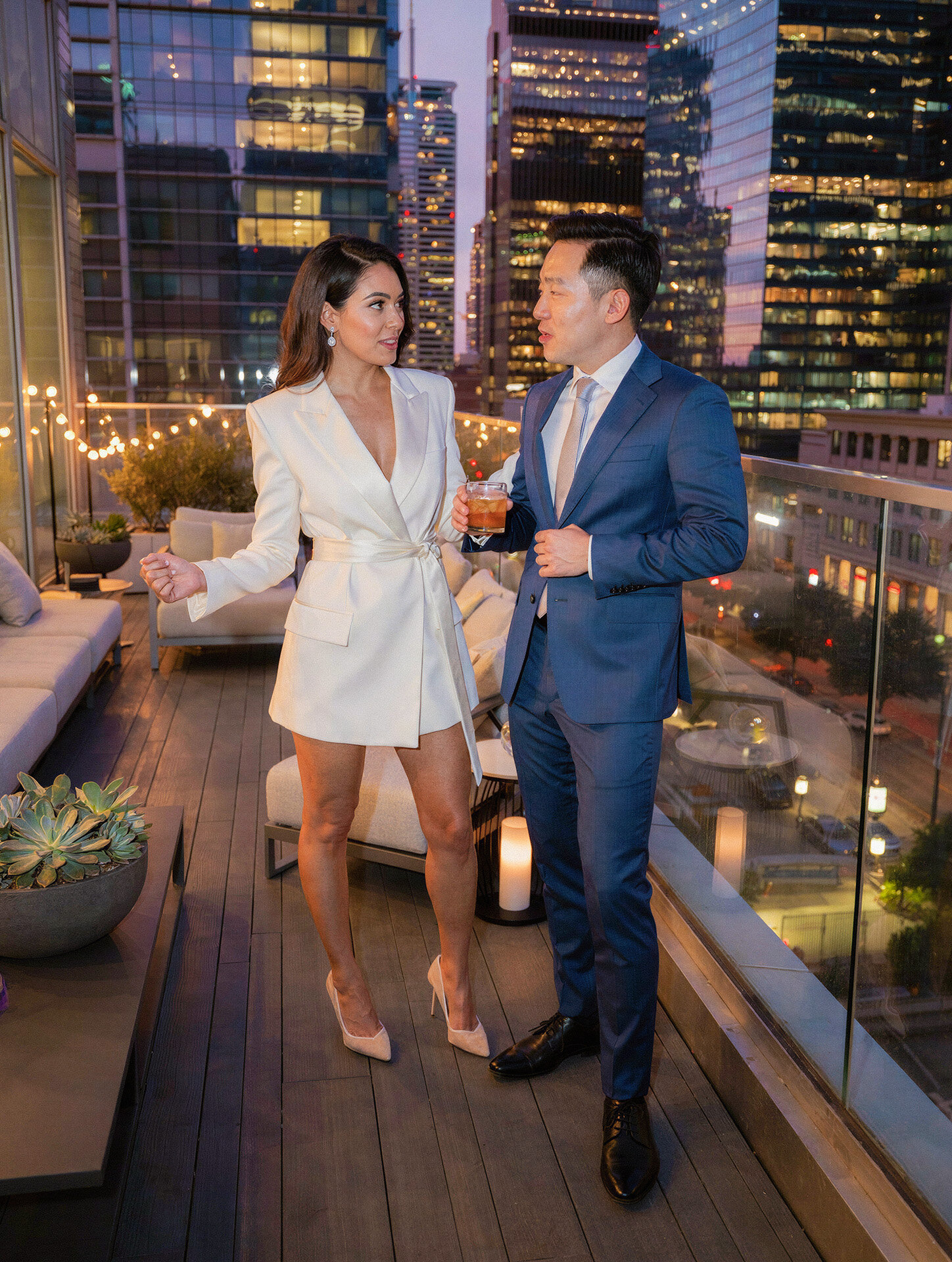 Candid bride and groom photograph at a luxury rooftop wedding venue in downtown Austin, Texas