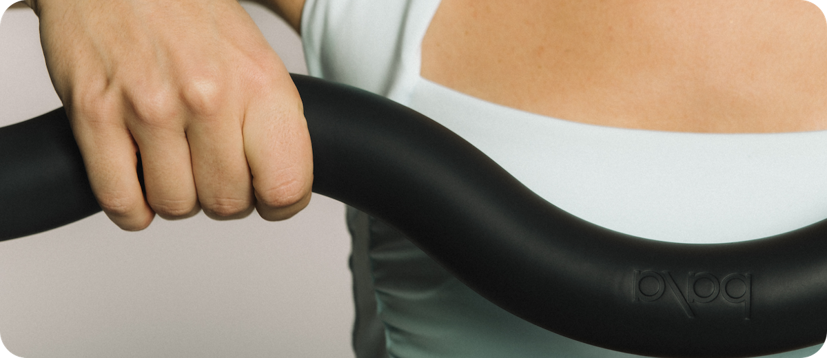 woman holding bala bar