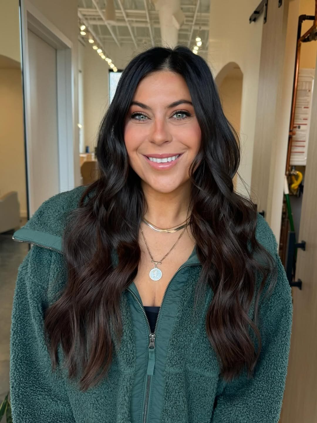 After shot showing added length and fullness from hair extensions, Echelon Salon Eagle