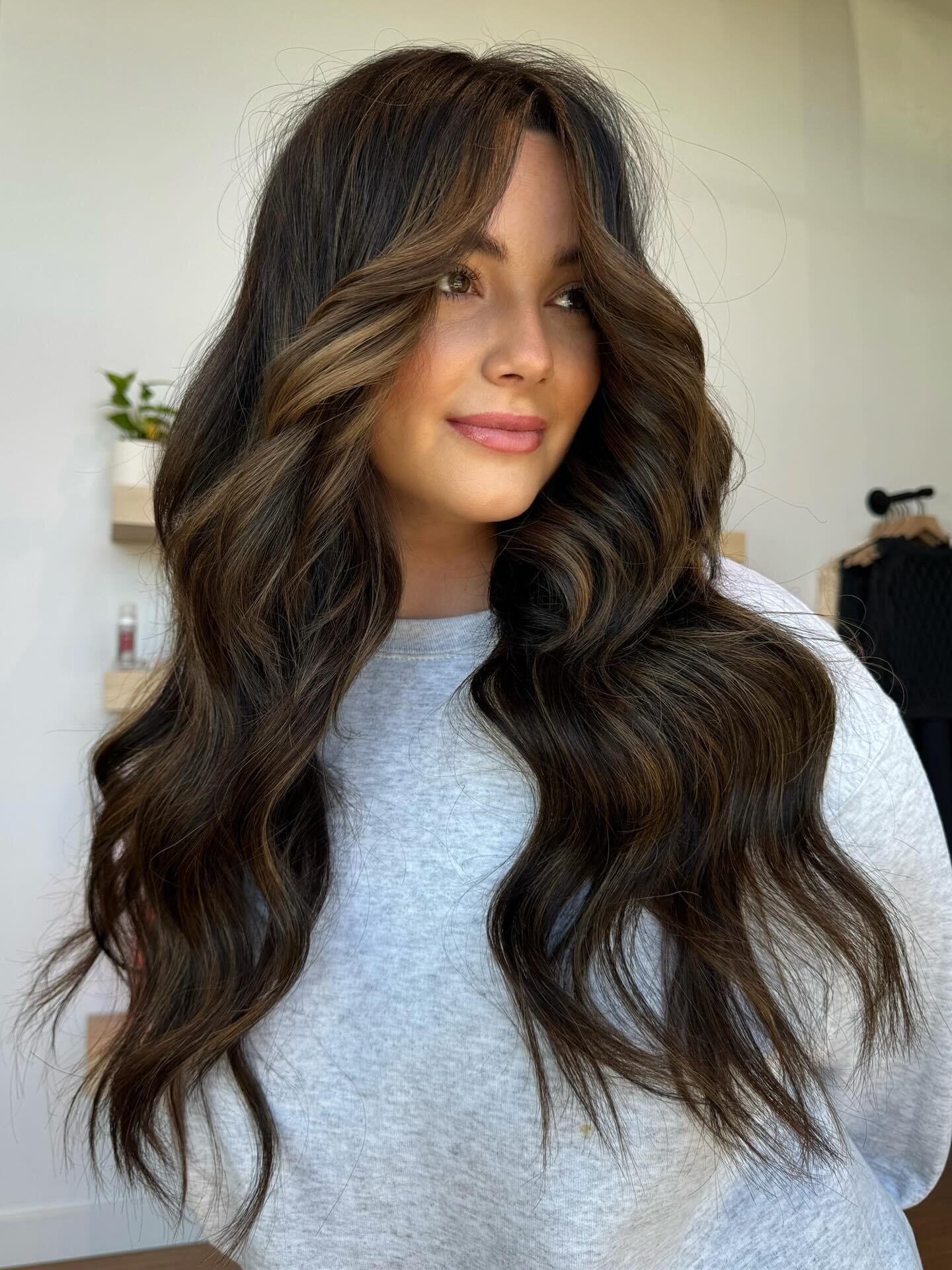 Custom brunette hair color, hand-tied extensions and blowout at Echelon Salon in Eagle, Idaho