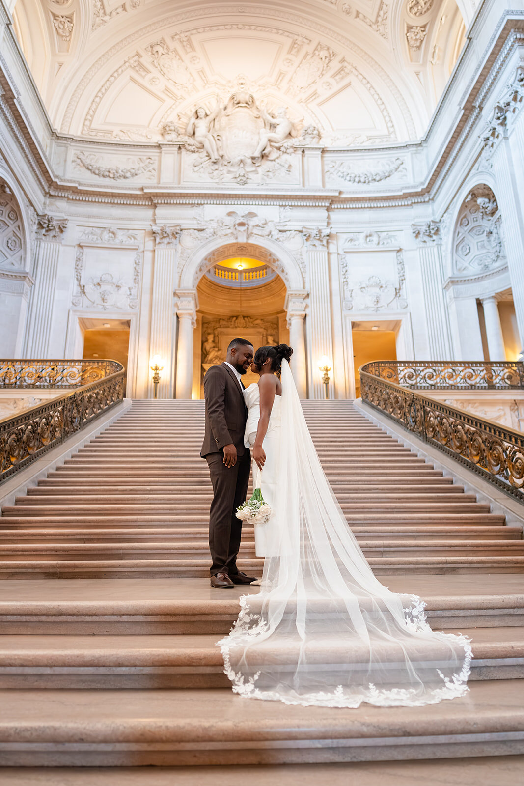 Kemi and Sunkami sharing a moment on the SF City Hall staircase