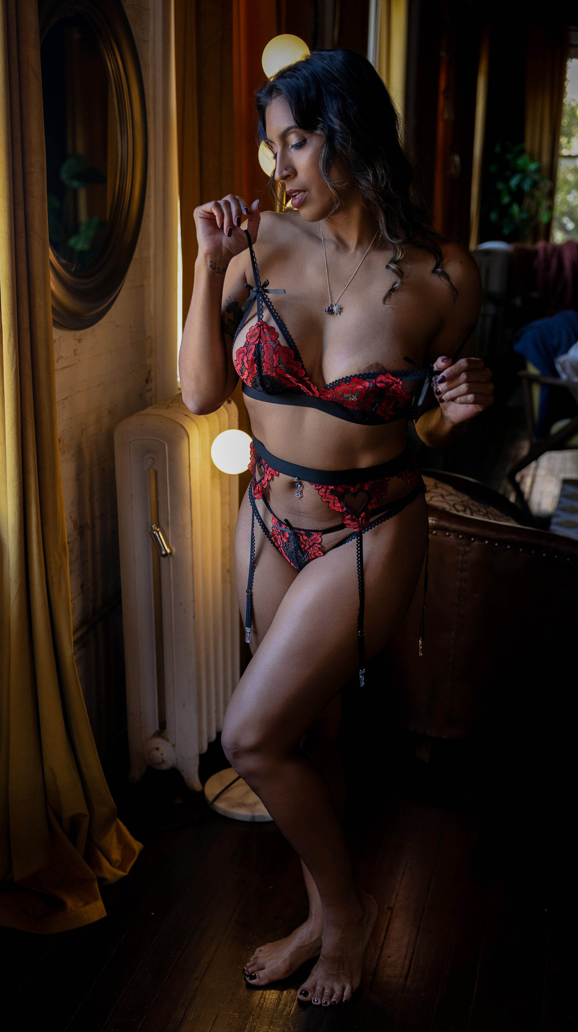 DC boudoir photography — woman in red and black lingerie