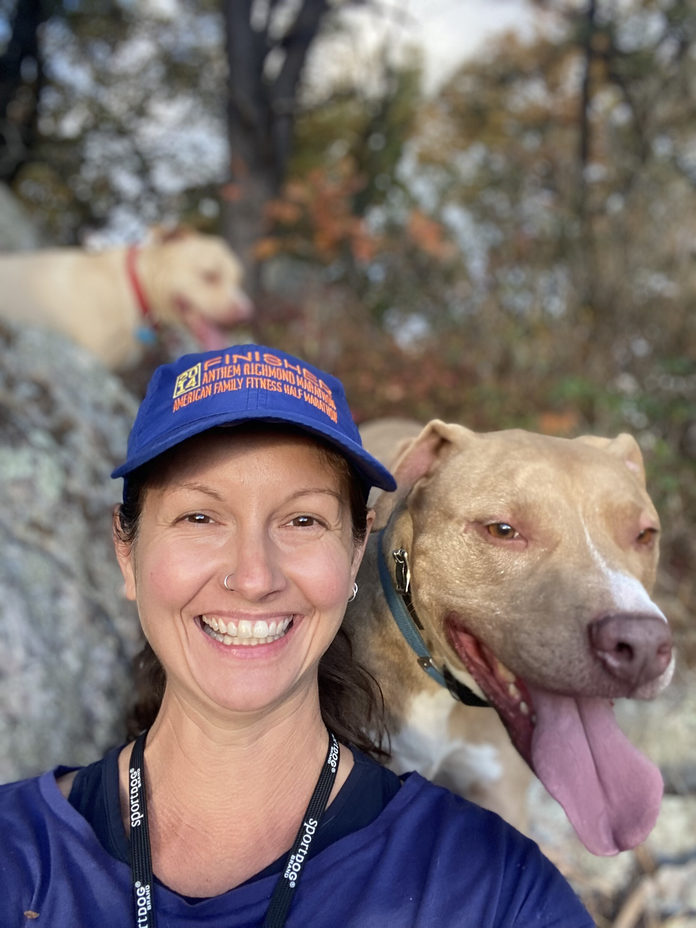 Rachel hiking with her dogs, Chance and Loki