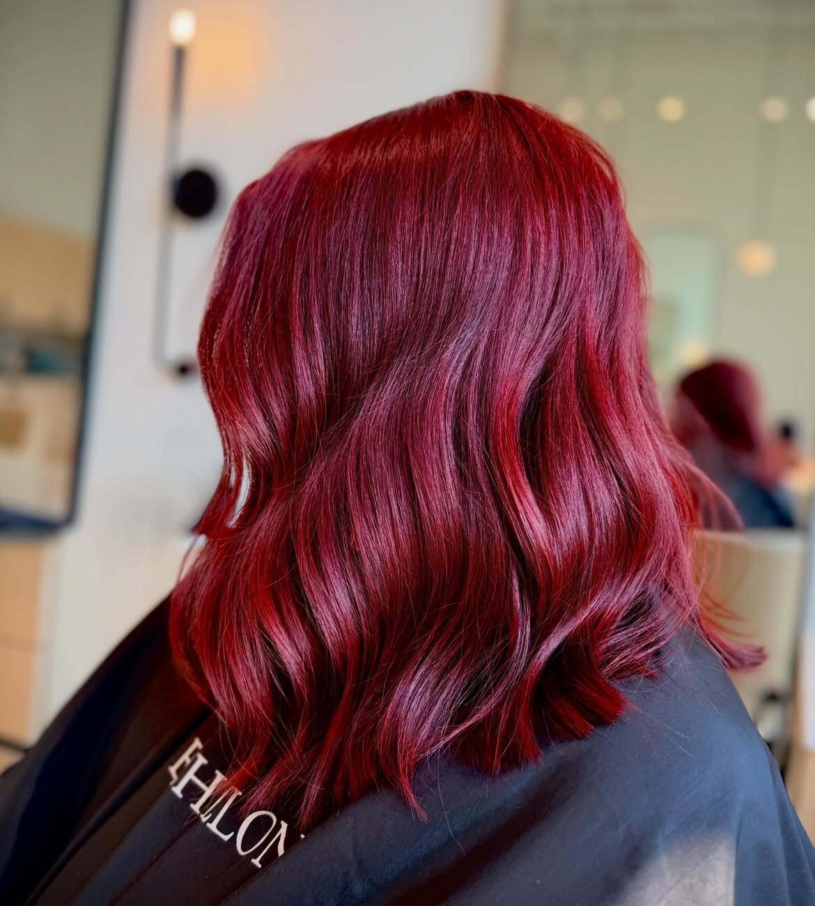 Red hair color and precision haircut at Echelon Salon, Eagle, Idaho