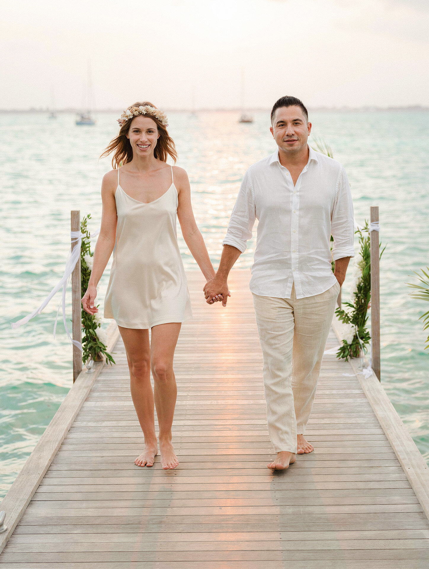 Bride and groom at a Key West pier photographed by Florida destination wedding photographer 4Karma Studio