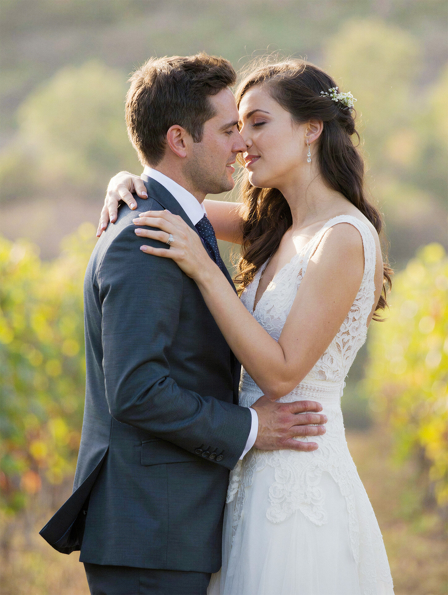 Intimate bride and groom portrait in a Burgundy vineyard in France