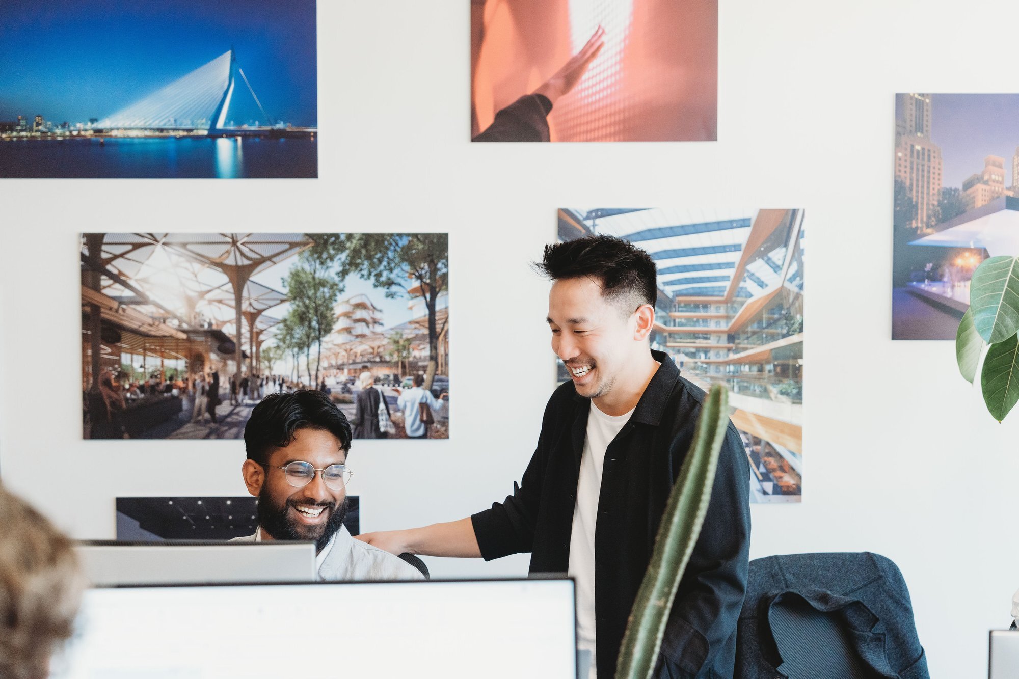 UNS team member candid at their desk in the Austin office