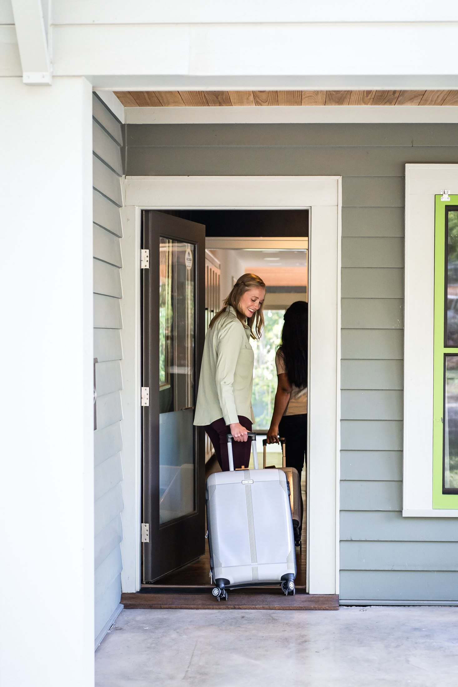 Guests entering a Vacasa vacation rental property in Austin