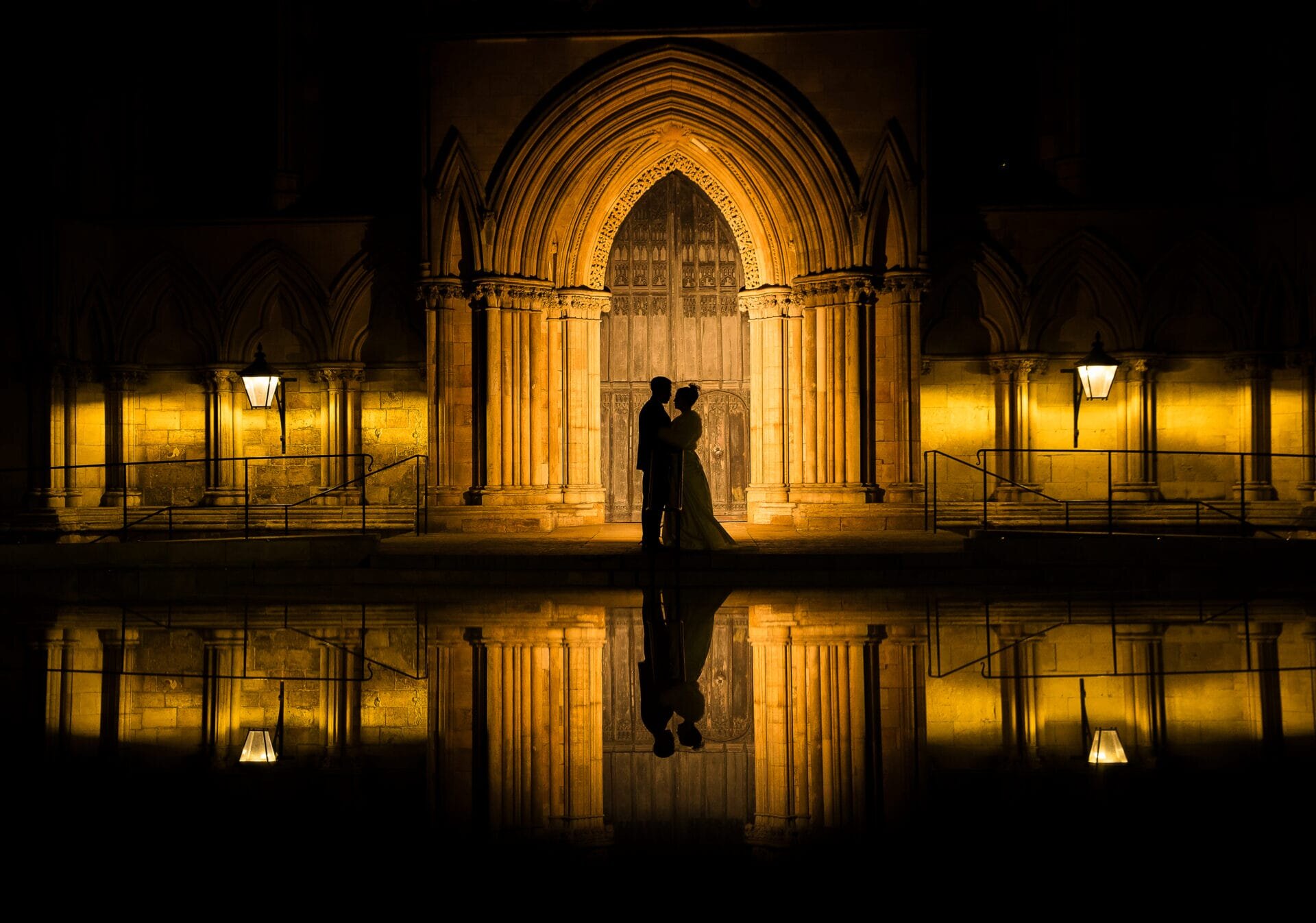 Silhouette of wedding couple at York Minster