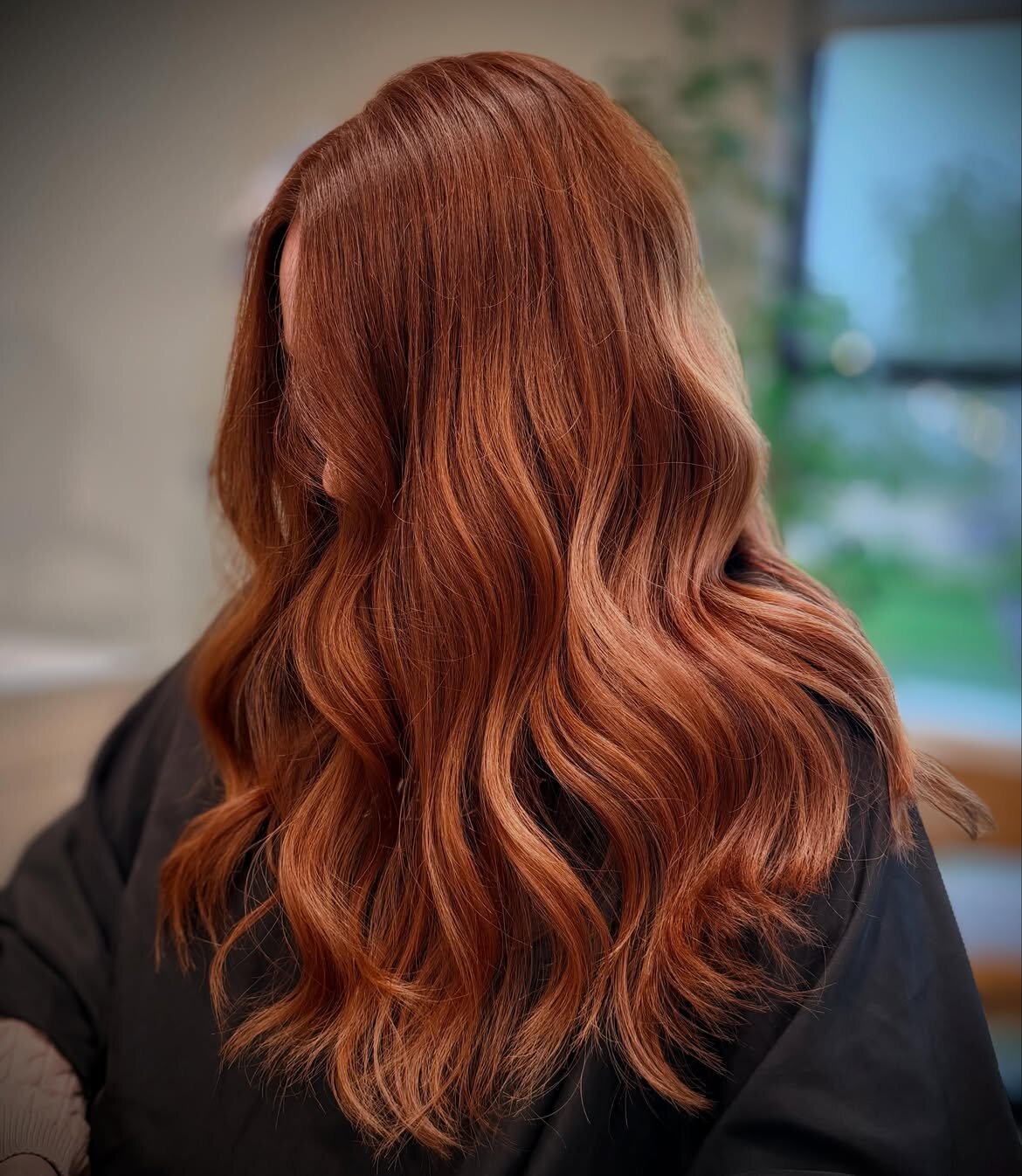 Red hair color done at our salon in Eagle, Idaho