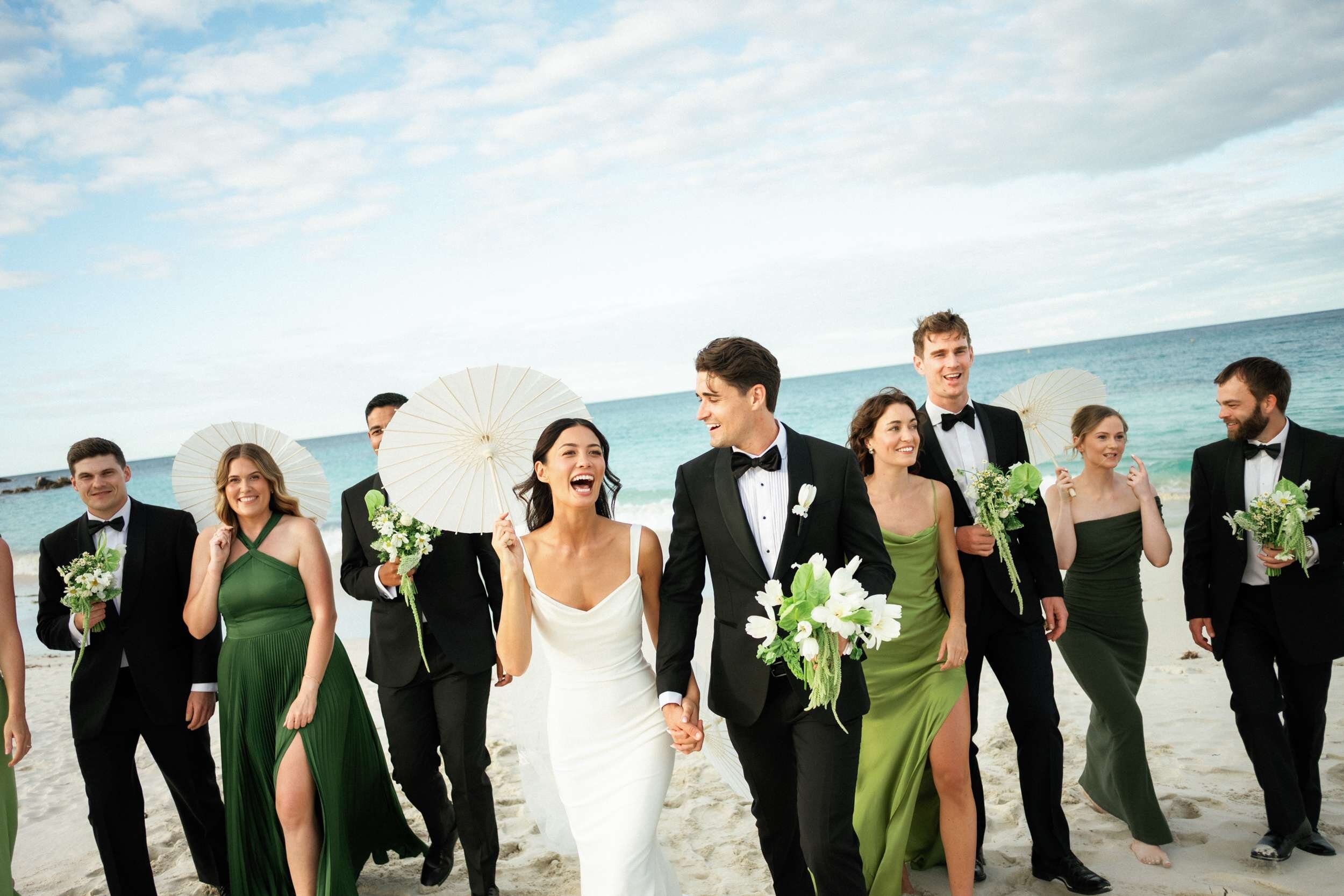 Perth wedding stylist at Bunker Bay, bridal party with white parasols