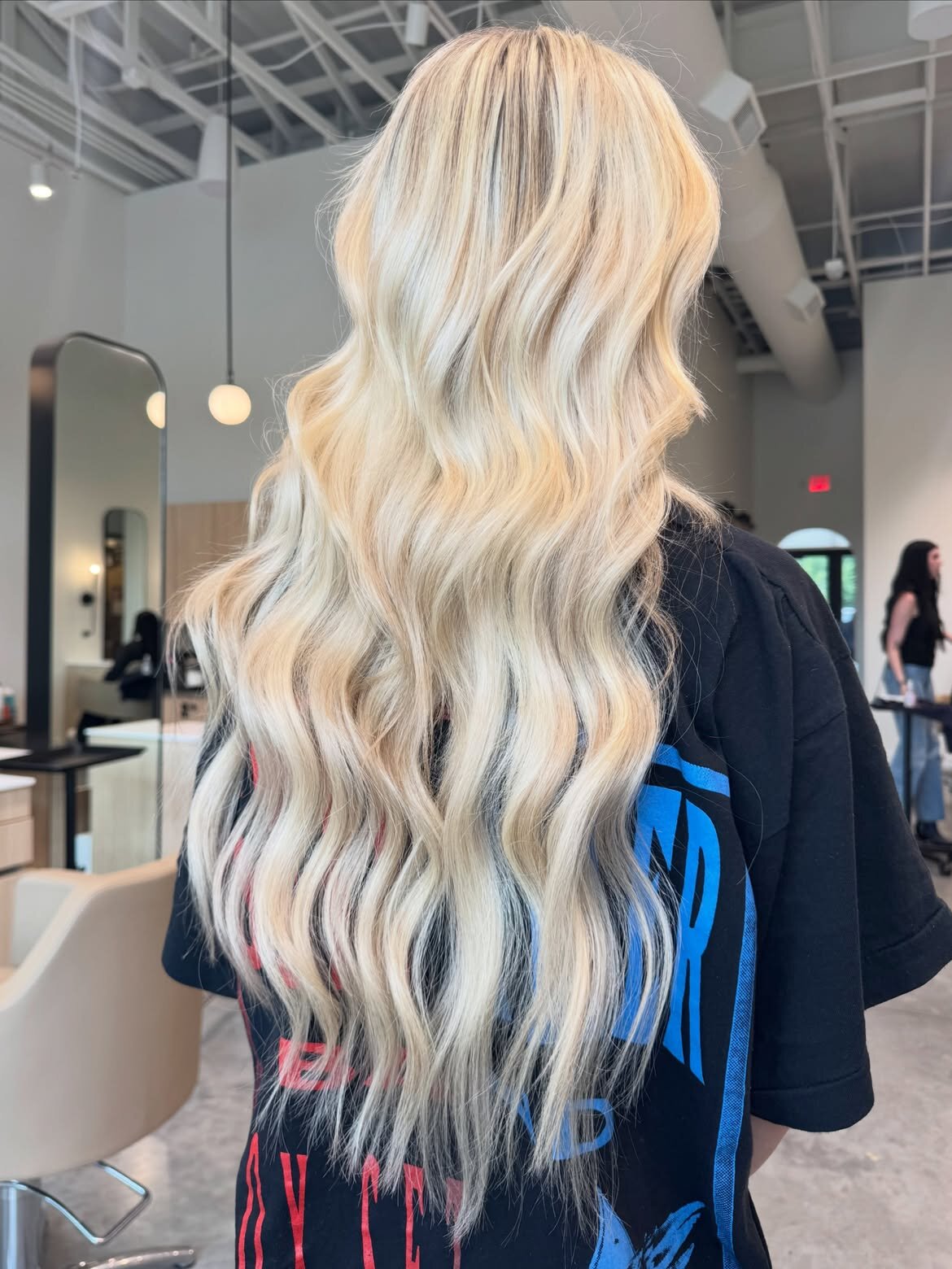 Blonde hair color and hand-tied extensions created at Echelon Salon in Eagle, Idaho