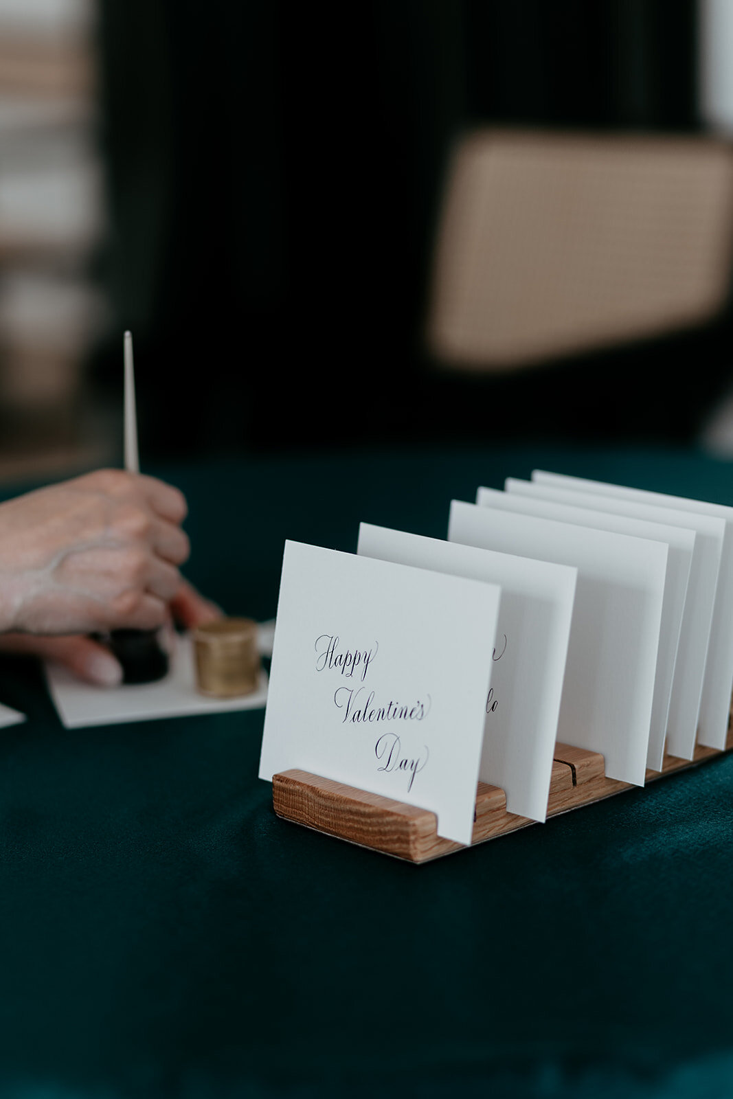 Handwritten notes on branded cards