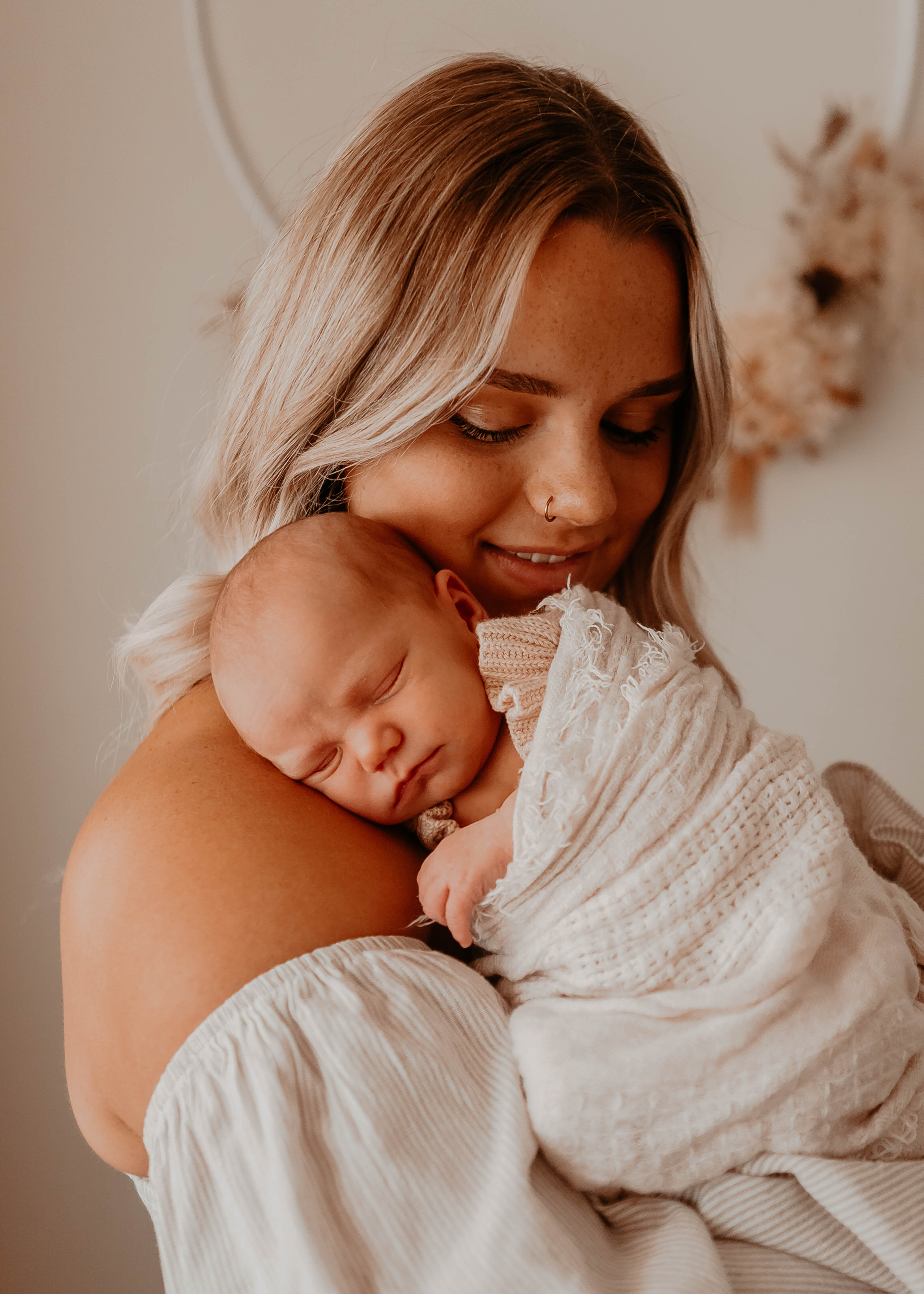 Replace with a warm intimate mother and baby photo