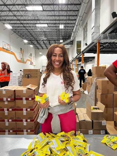 Rev. Dr. Lael C. Melville serving at the North Texas Food Bank