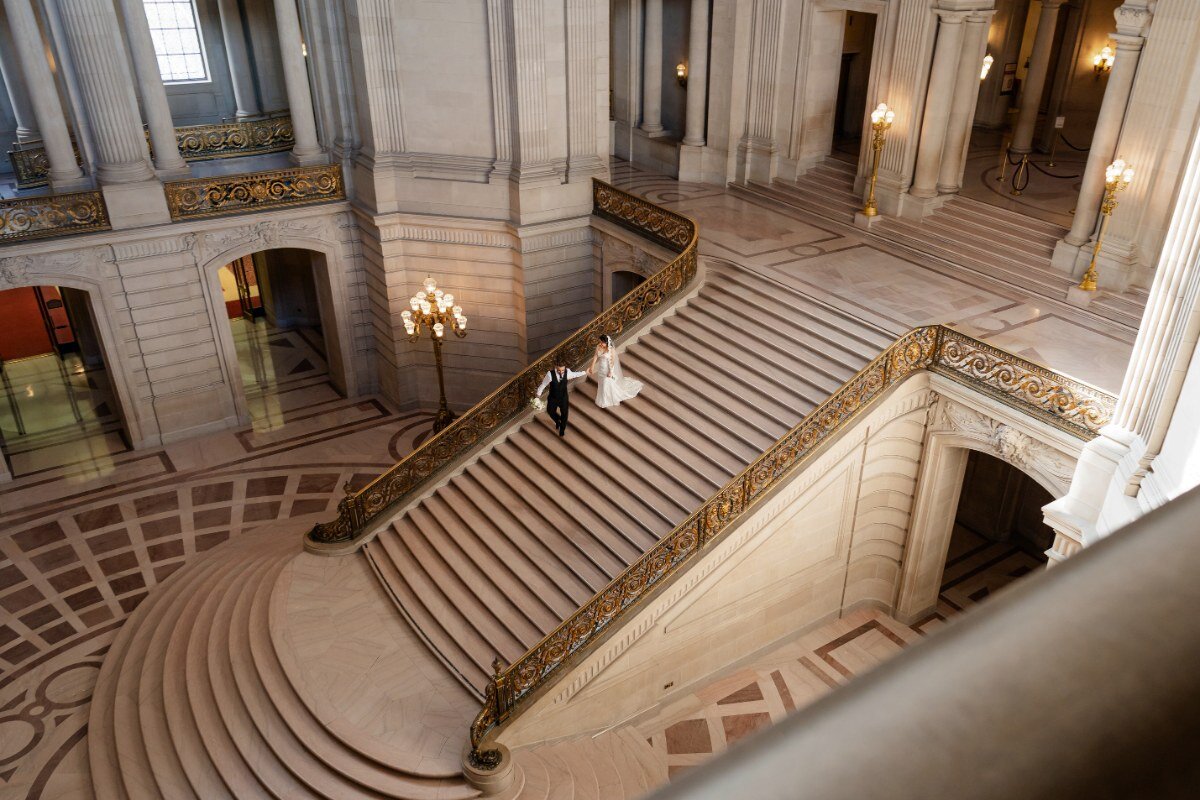 SF City Hall Wedding Guide cover — couple on the grand staircase