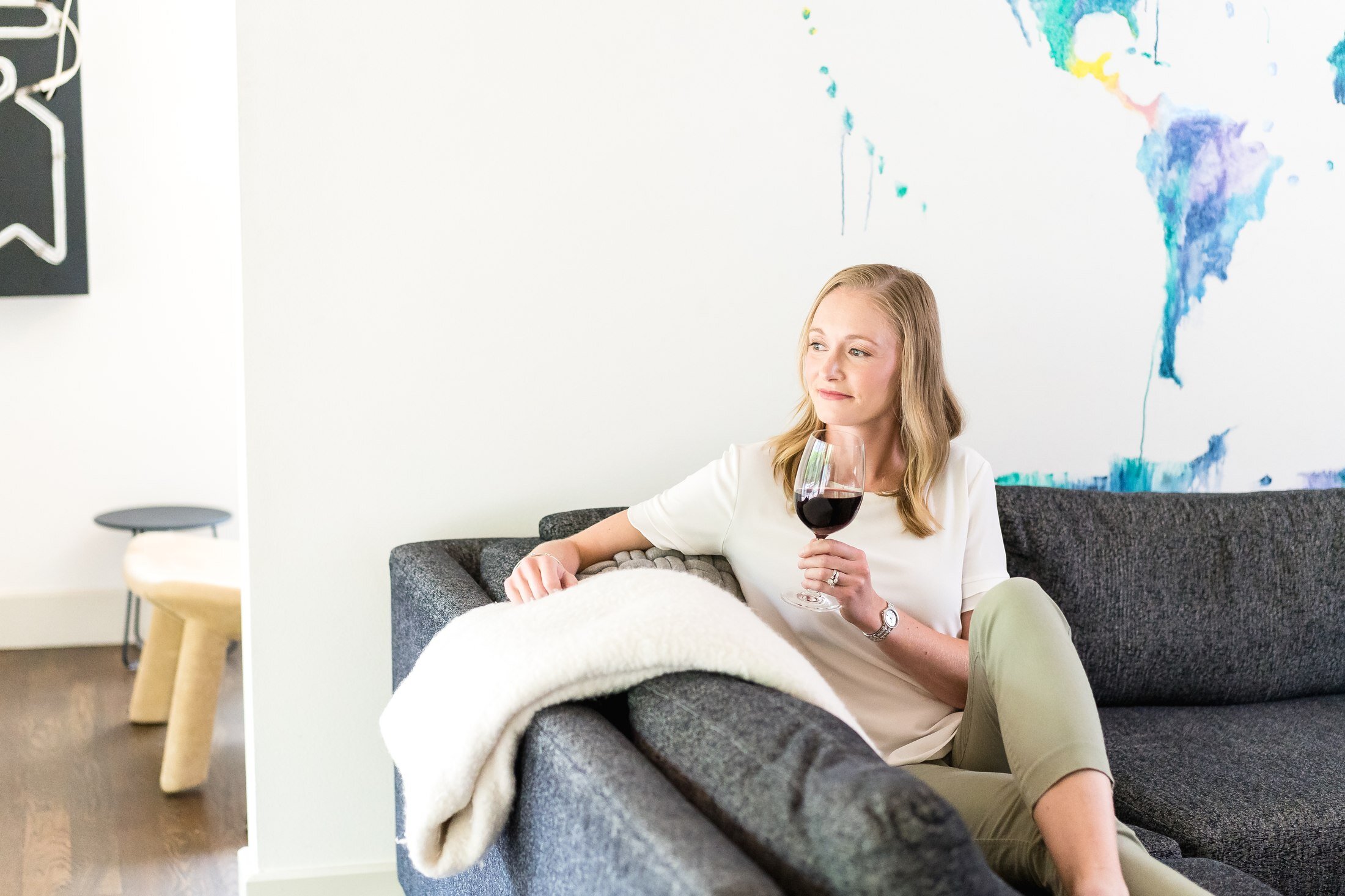 Guest relaxing with a glass of wine at a Vacasa rental in Austin