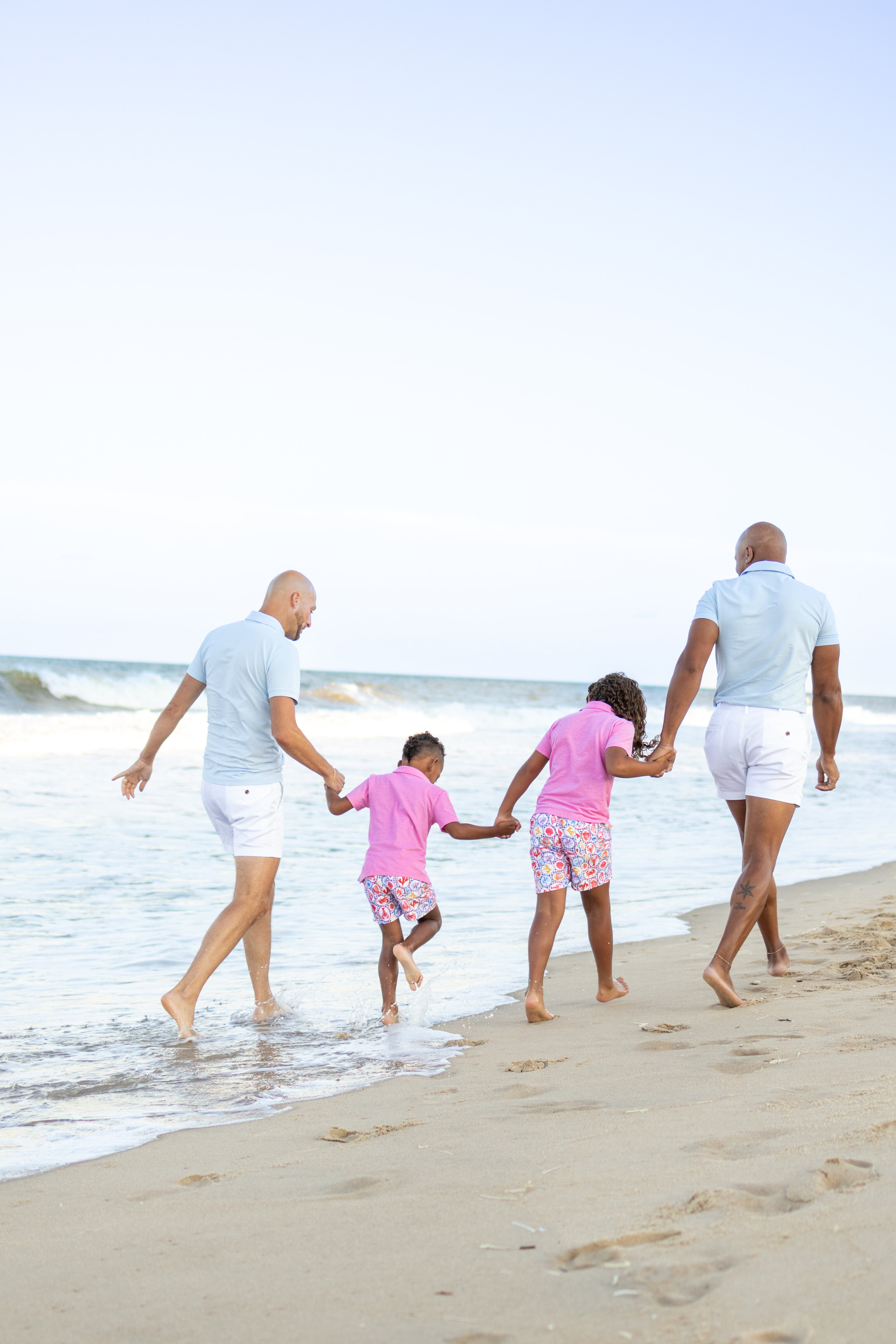 Our family walking together on the beach