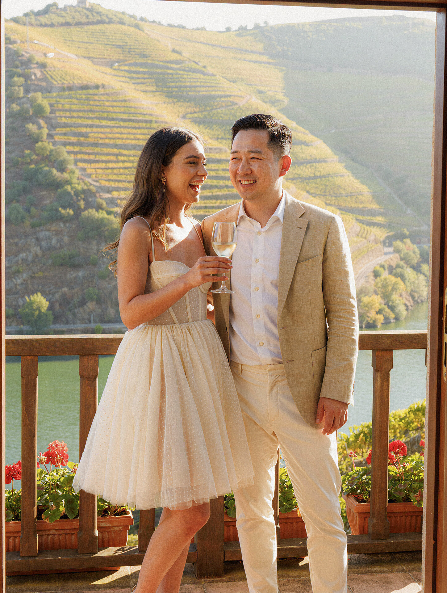 Douro Valley destination wedding photography of a bride and groom laughing