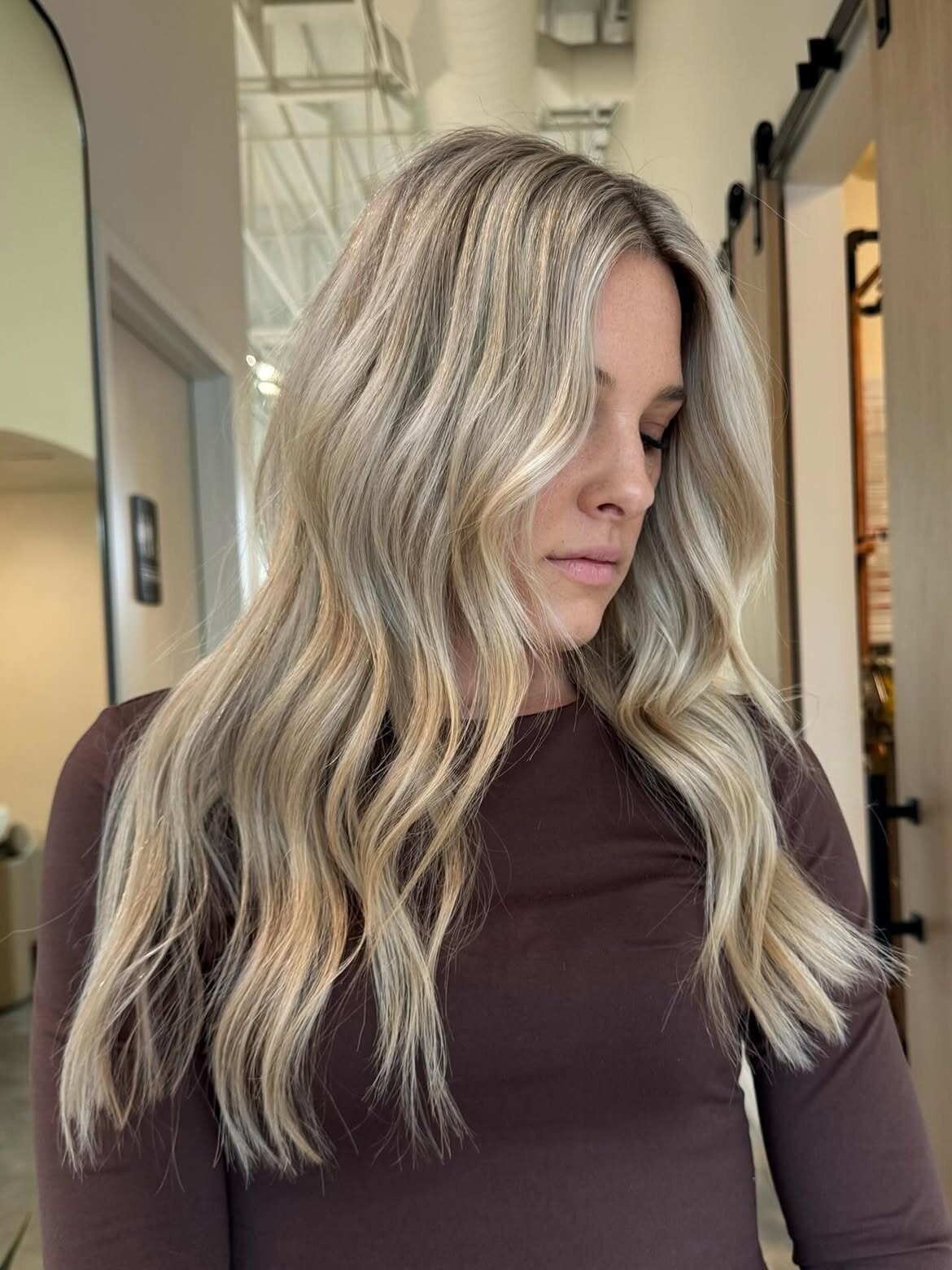 Blonde hair color and hand-tied extensions done at our salon in Eagle, Idaho