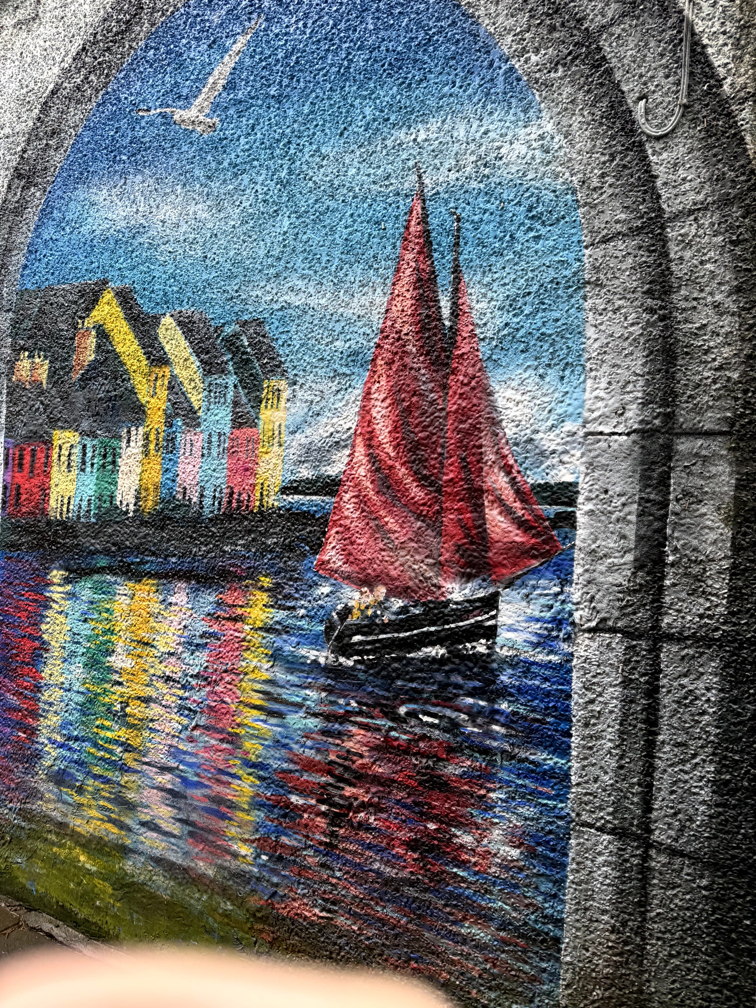 Galway harbor mural painted on stone arch
