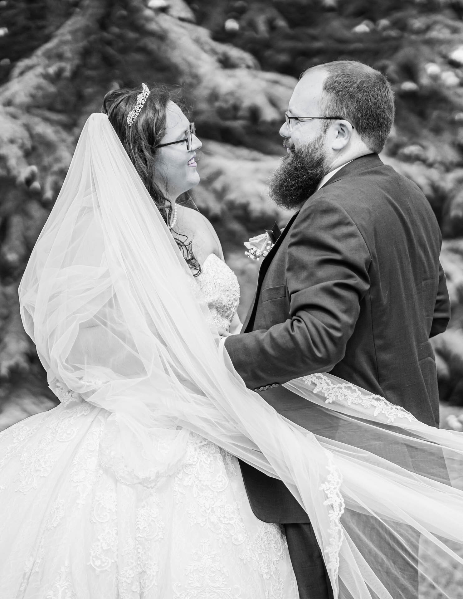 Black and white candid wedding couple portrait