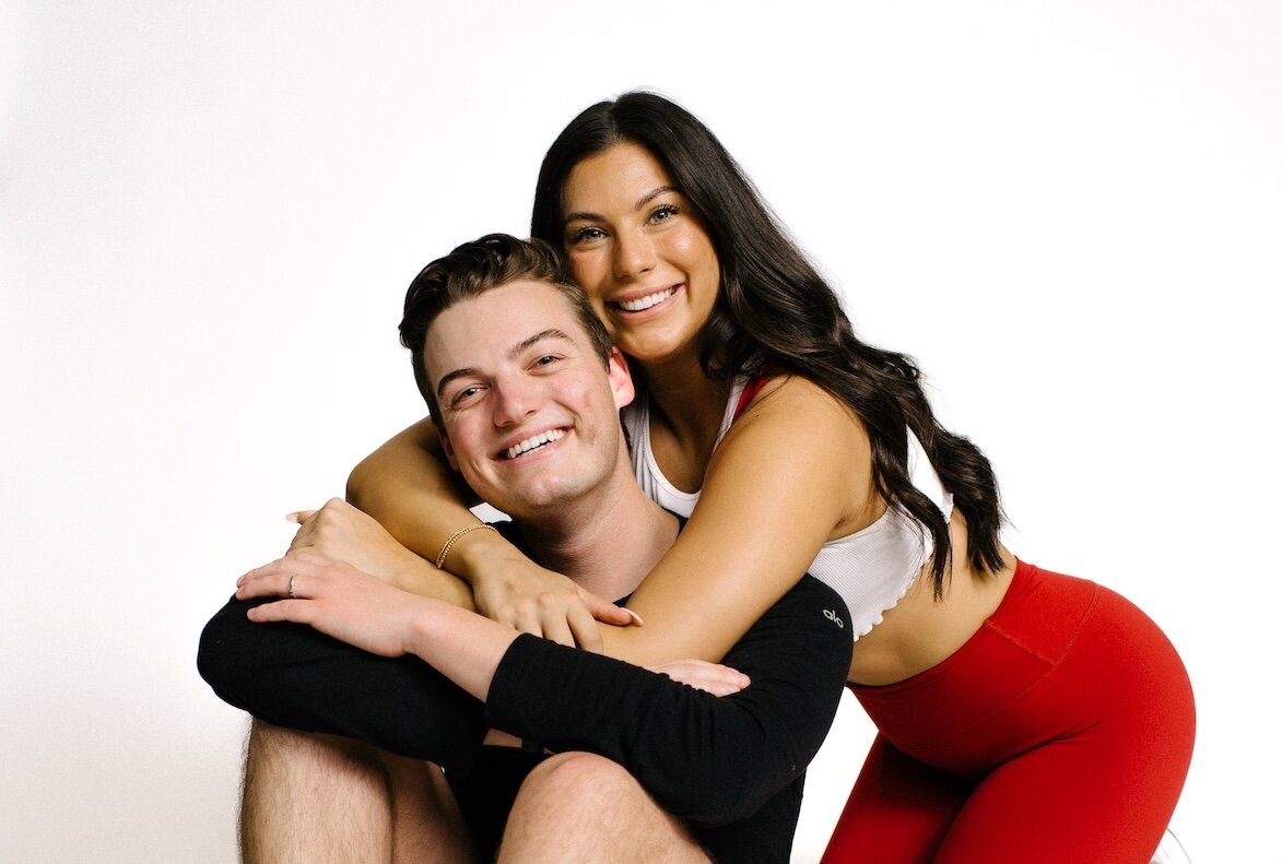 Cycle instructors hugging