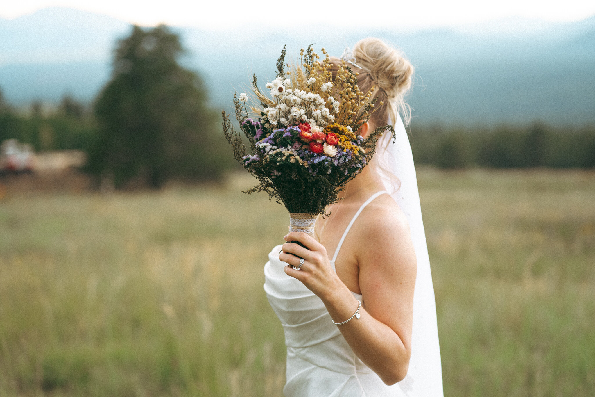 Bride holding a bouqet portrait during a Flagstaff elopement