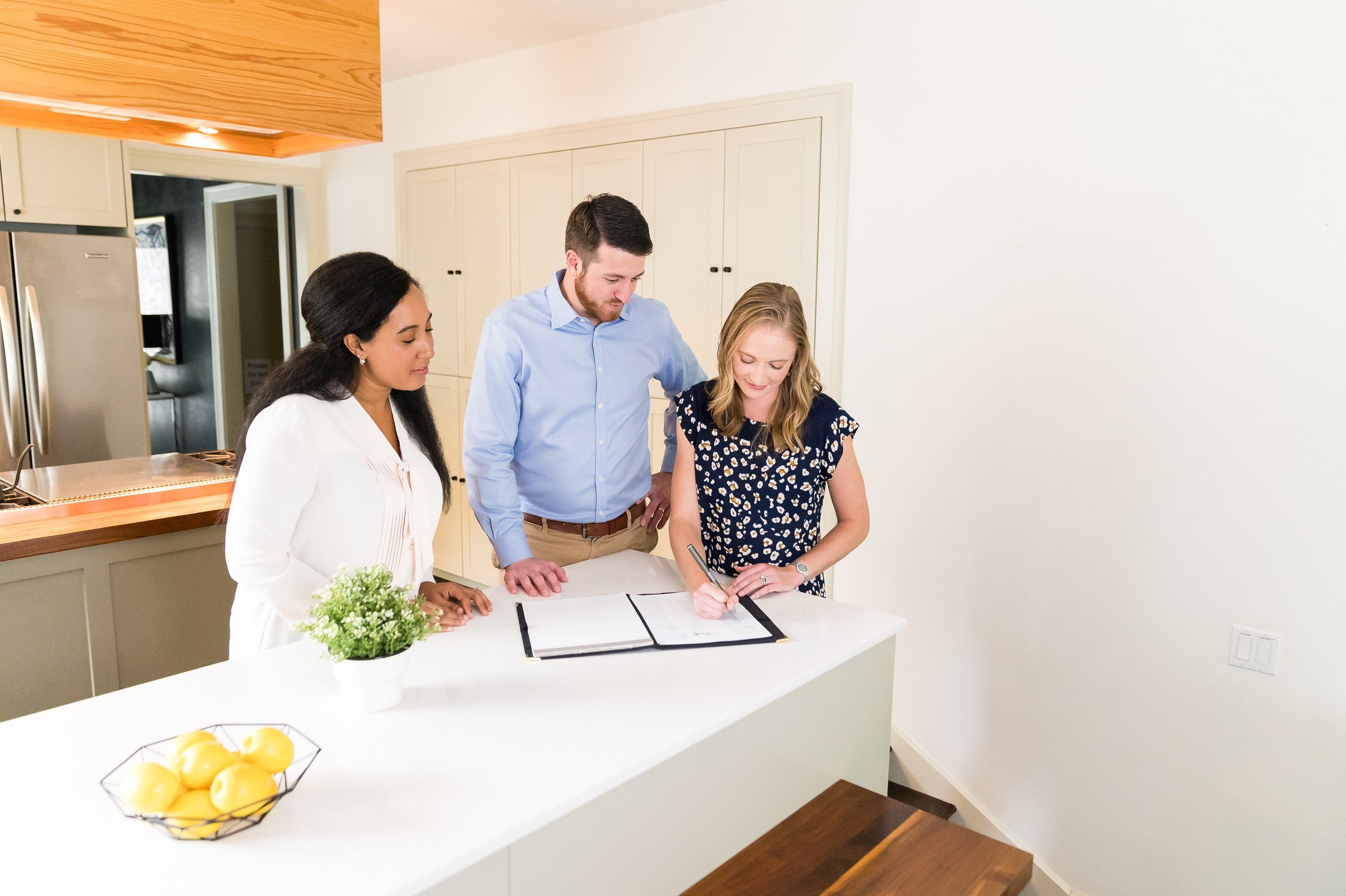 Vacasa homeowner signing paperwork in Austin