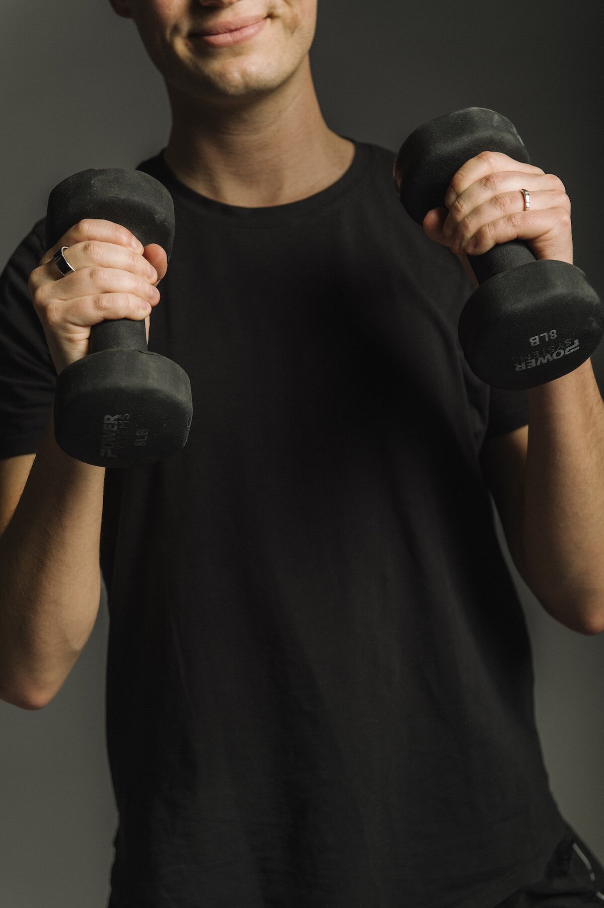 Dumbbells held at chest height in cycle and strength