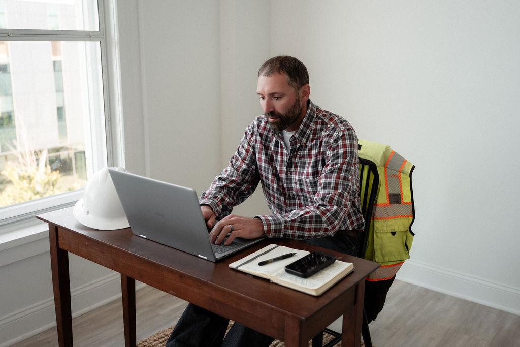 Daniel Bendickson working at his desk