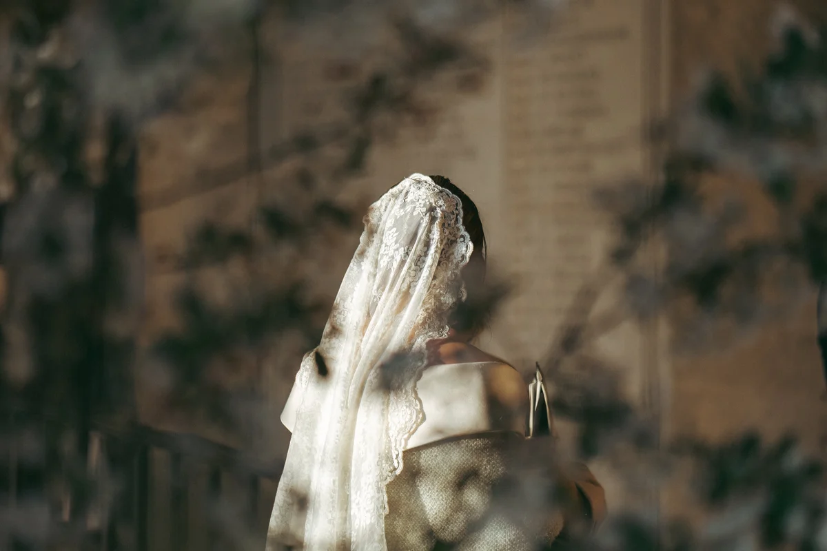 Bride in a lace veil at Worcester College, Oxford